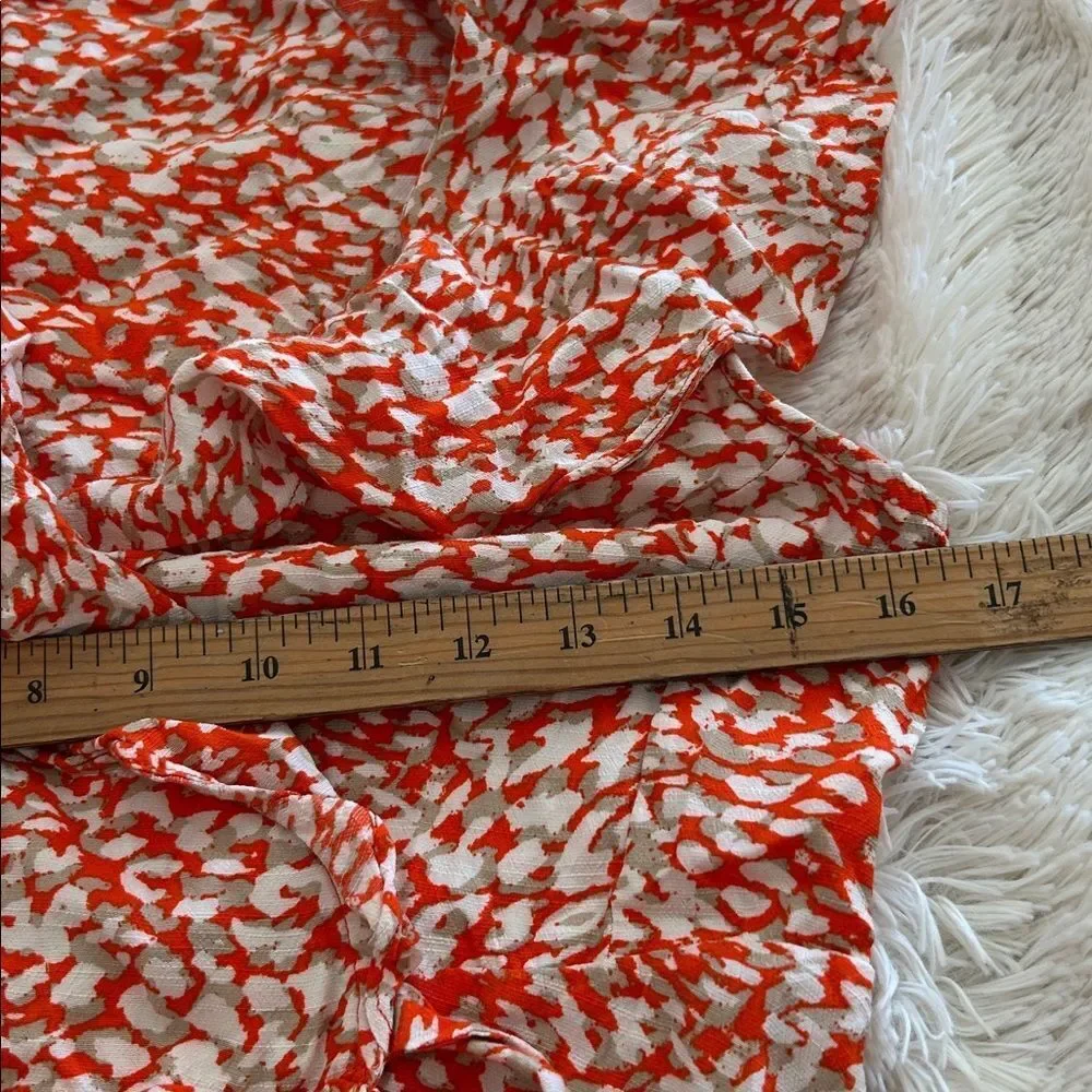 Free People French Quarter Wrap Mini Dress orange and white animal small